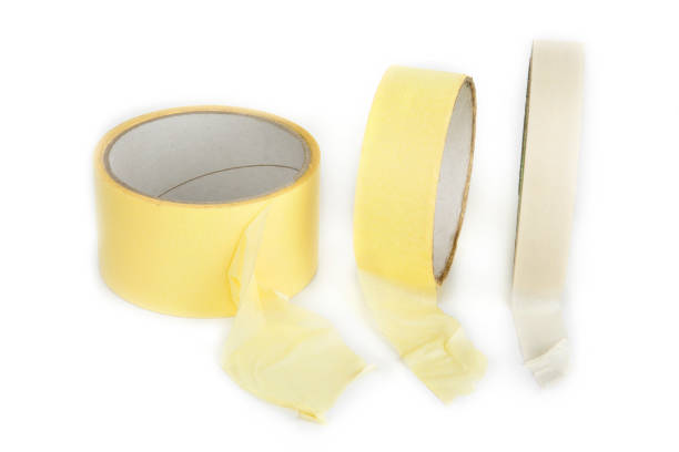 istock Three rolls of masking tapes on a white 1088690270