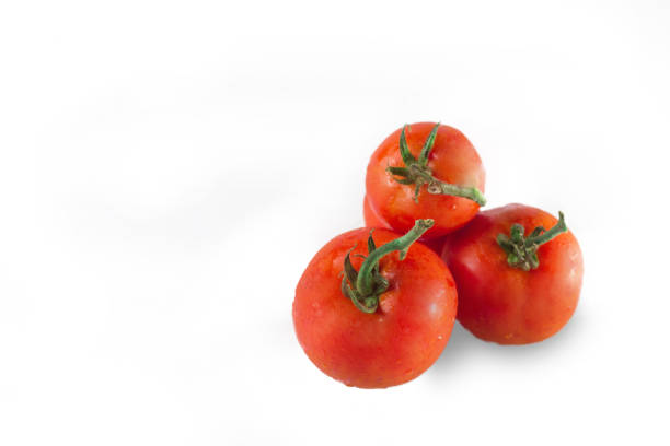 Many wet fresh tomatoes with white background ,Clipping path