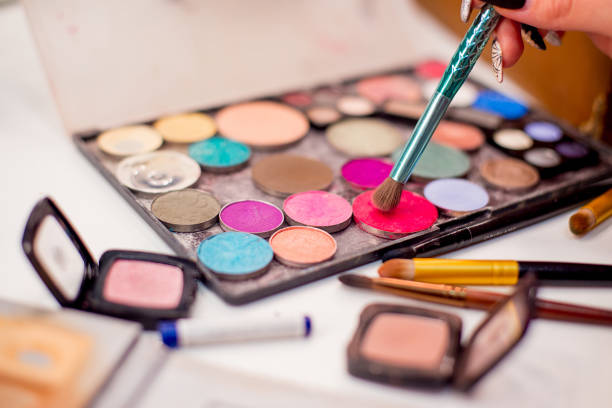 istock set of things for makeup: brushes, mascara, eyeliner 1088693374