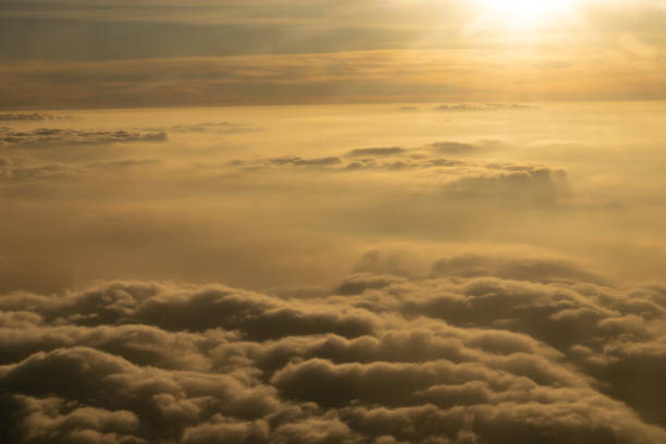 istock Image of Sunrise above the clouds from airplane window, India 1088695796