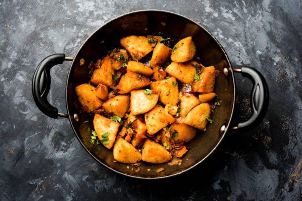 istock Masala fried Idlies - south indian Snack made using with leftover idly served with tomato ketchup. selective focus 1088698618