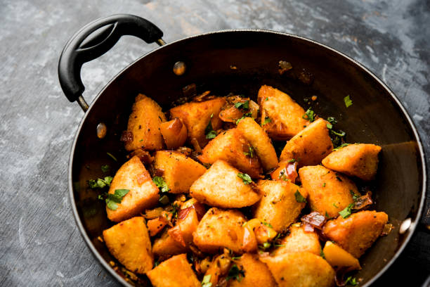 istock Masala fried Idlies - south indian Snack made using with leftover idly served with tomato ketchup. selective focus 1088698722