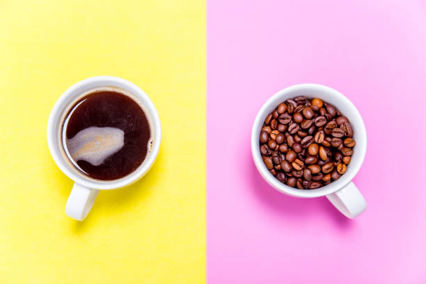 istock Coffee cup and coffee beans on white background 1088698784