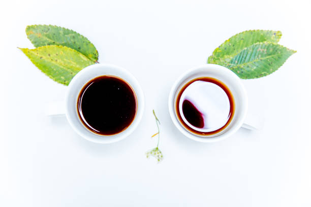 istock Coffee cup and coffee beans on white background 1088698866