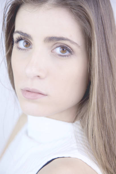 istock Sad woman washed out looking camera 1088710634