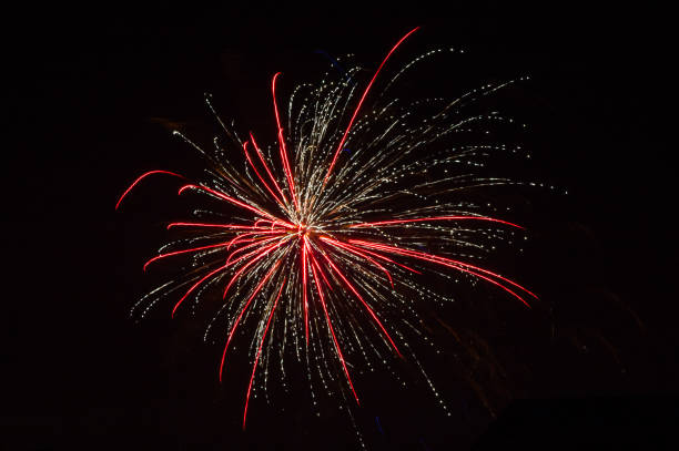 istock Colorful fireworks over dark sky, displayed during a celebration New Year. 1088717304