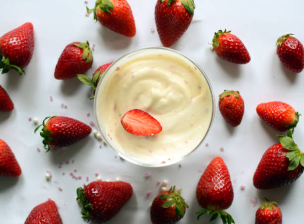 istock A cup of vanilla pudding with strawberries.Vanilla pudding closeup. 1088719630