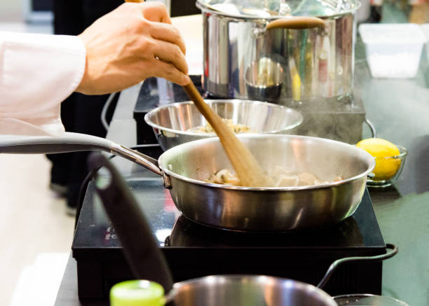 istock Chef cooking food in the kitchen, Chef preparing food 1088727794