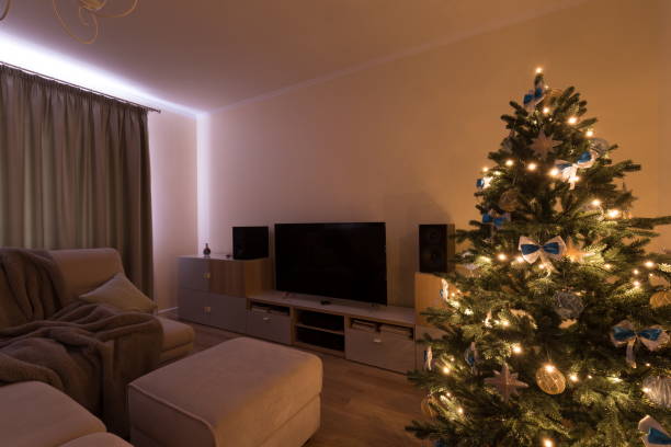 istock Interior. living room, Christmas tree, yellow light 1088729730