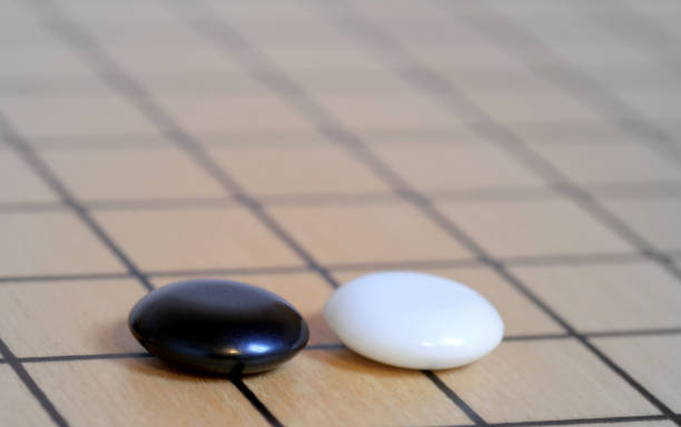 istock Go game - black and white stones 1088738290