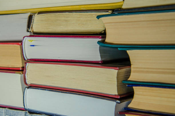 istock a stack of colorful books on the shelf in a library 1088754058