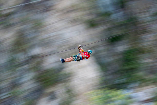 High Speed Zip Line With a Motion Blurred Background stock photo