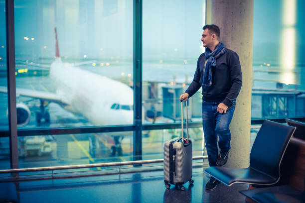 istock Passenger Waiting for His Flight at the Airport 1088763214