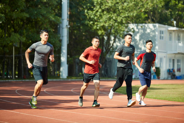 istock track and field athletes running in stadium 1088785738