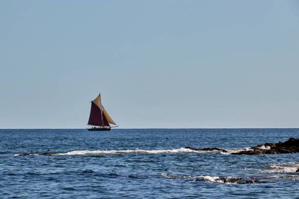 Gaff Rigged Saiing Boat Gaff rigged traditional sailing boat sailing along the English Channel off Cornwall gaff rigged stock pictures, royalty-free photos & images