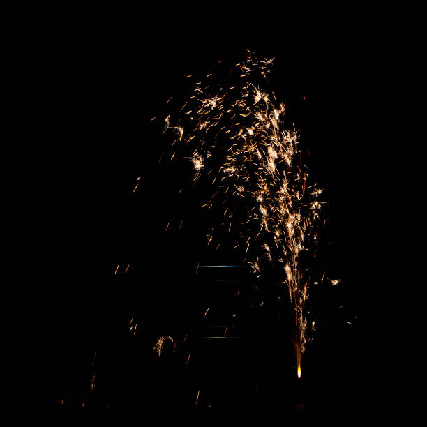 istock Yellow orange firework against night sky close up 1088791056