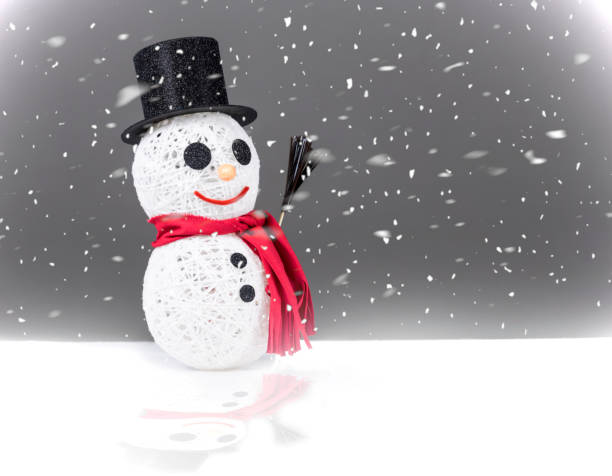 istock Smiling snowman standing in the snow 1088794226