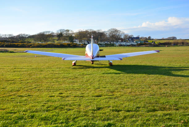 istock Light Aircraft on Grass Airfield - Rear View 1088802512