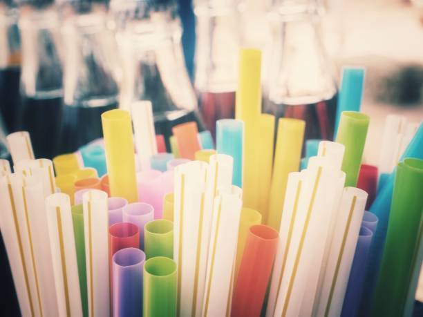 istock Colorful drinking straws and cola drink 1088813230
