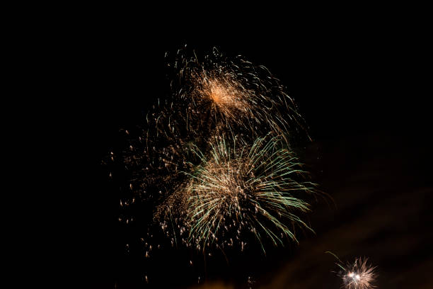 istock colorful fireworks in black background 1088832998