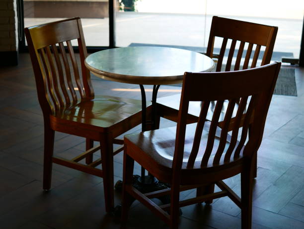 istock Empty Chair Desk with sunlight nobody space in restaurant 1088835428