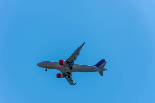 istock The airplane running through the sky 1088843736