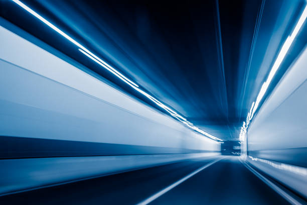 istock Motion blurred car in tunnel 1088858624