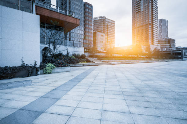 istock Empty pavement front of modern office buildings 1088858686