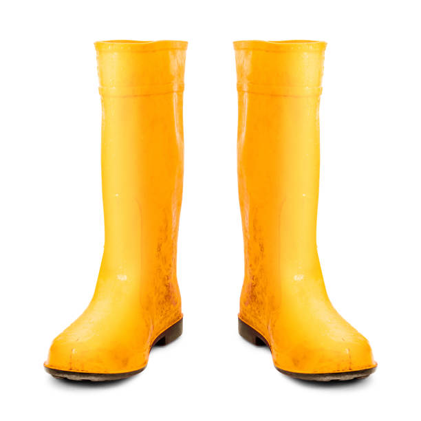 istock Yellow rubber boots isolated on white background. Worker boots. ( Clipping path ) 1088860180