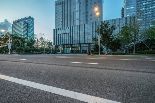 istock City empty road with modern buildings background 1088864698