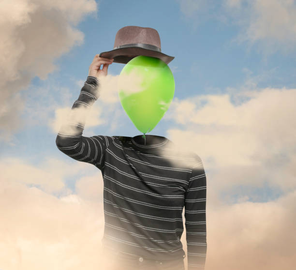 istock Woman with air for a head holding hat 1088865092