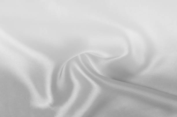 istock texture Cloth is white silk. Glowing like a layer of freshly fallen snow this antique white silk is absolutely stunning. A luxurious mixture of silk and wool gives him a smooth, slightly palpable hand 1088865160