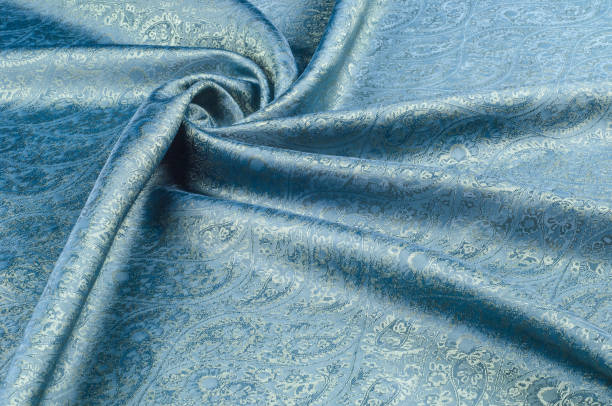 istock Background texture, pattern. Blue paisley silk chiffon mod fabric by the yard. Crinkled, flowy, soft, very light, 1088865350