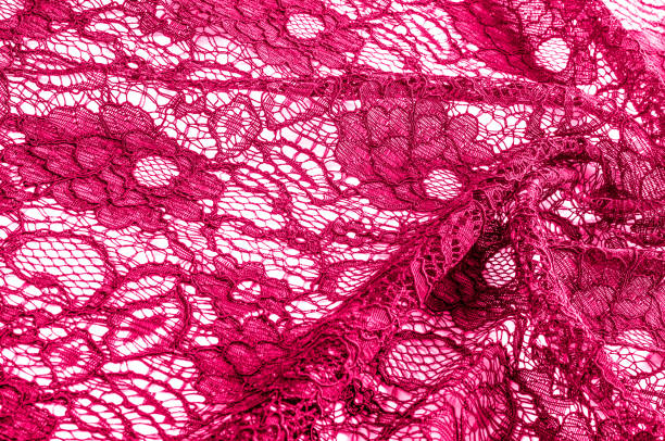 istock Texture, background, pattern. Cloth red lace. Background of fabric from lace stylized roses. Abstract lace pattern with flowers. Wallpaper, underwear and jewelry. Your invitations 1088866958