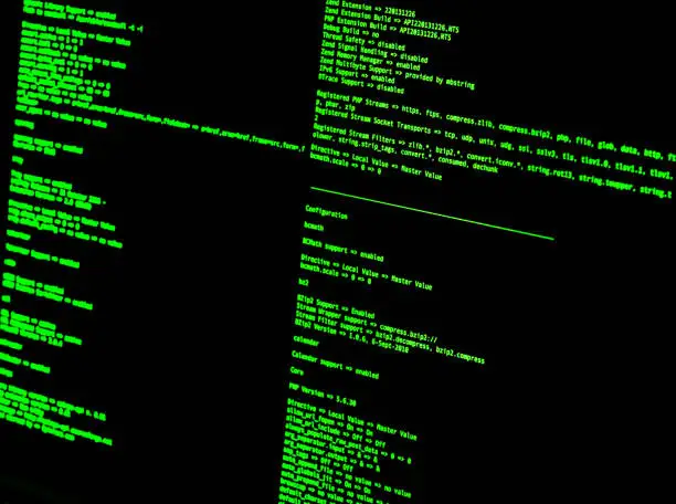 Photo of Green code in command line interface on black background. UNIX bash shell