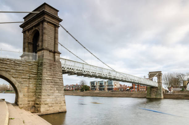 istock Long exposure of Wilford Suspension Bridge 1088874130