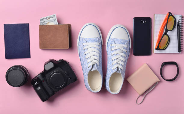istock Gadgets and accessories layout on a pink background. 1088880154