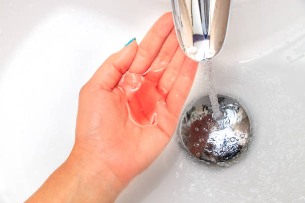 istock Liquid soap in a woman's hand in the sink 1088880452