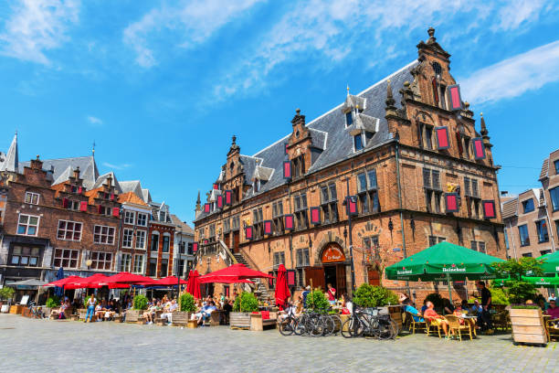historical buildings at the Great Market in Nijmegen, Netherlands Nijmegen, Netherlands  May 21, 2018: historical buildings at the Great Market with unidentified people. Nijmegen is the oldest city in the Netherlands gelderland photos stock pictures, royalty-free photos & images