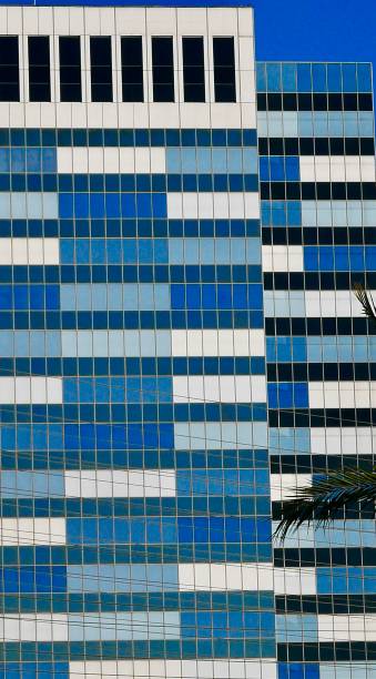 istock Tall Buildings with Vertical Line Exteriors 1088888184
