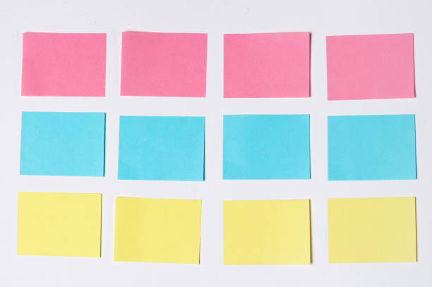 istock Mock-up of many empty multicolored office stickers on a wooden background. Copy space, space for text. Office concept 1088889286