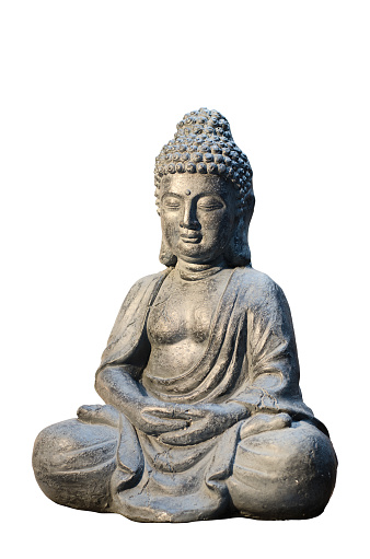 Buddha statue sitting in meditation pose isolated on white background.