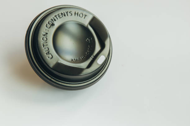 istock Black cover coffee cup, Caution: contents hot, disposable plastic cover protect the hot coffee on white background 1088906112