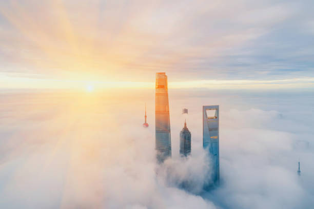 Aerial View Of Shanghai at sunrise Aerial View Of Shanghai at sunrise shanghai tower stock pictures, royalty-free photos & images