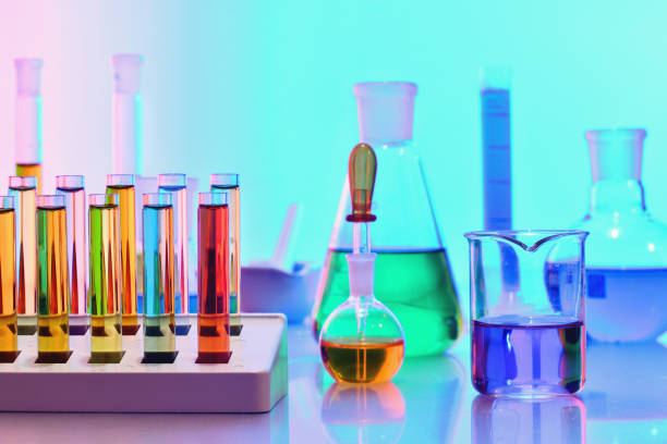 istock Laboratory glassware with colorfu chemicals, chemistry science 1088912234