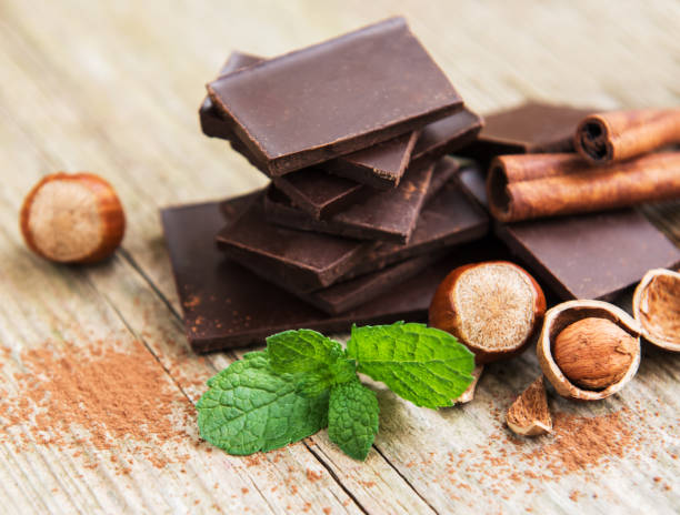 istock Chocolate with hazelnuts on a old wooden table 1088914248