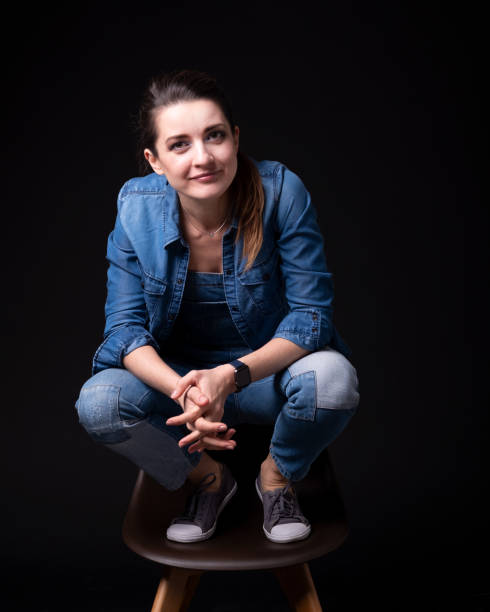 istock brunette girl in blue denim jacket and pants 1088916114