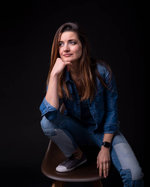 istock brunette girl in blue denim jacket and pants 1088916126