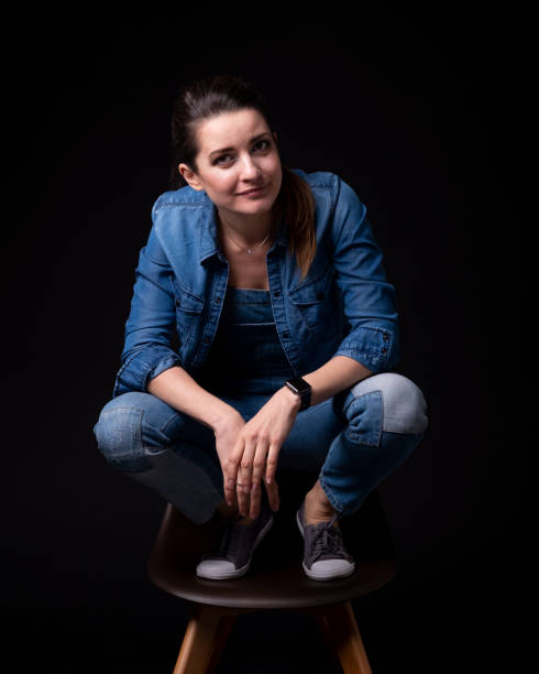istock brunette girl in blue denim jacket and pants 1088916150