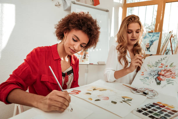 istock Two beautiful talented artists feeling happy working together 1088920596
